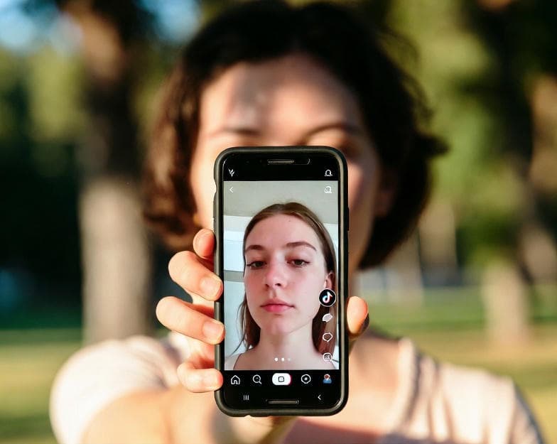 Saving TikTok videos on iPhone with TikMaker
